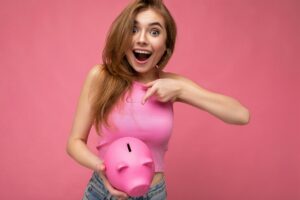Portrait photo of happy positive surprised young beautiful attractive blonde woman with sincere wow