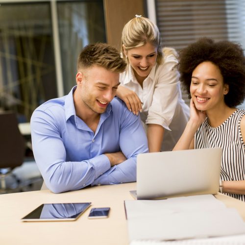 View at young business people working in a modern office